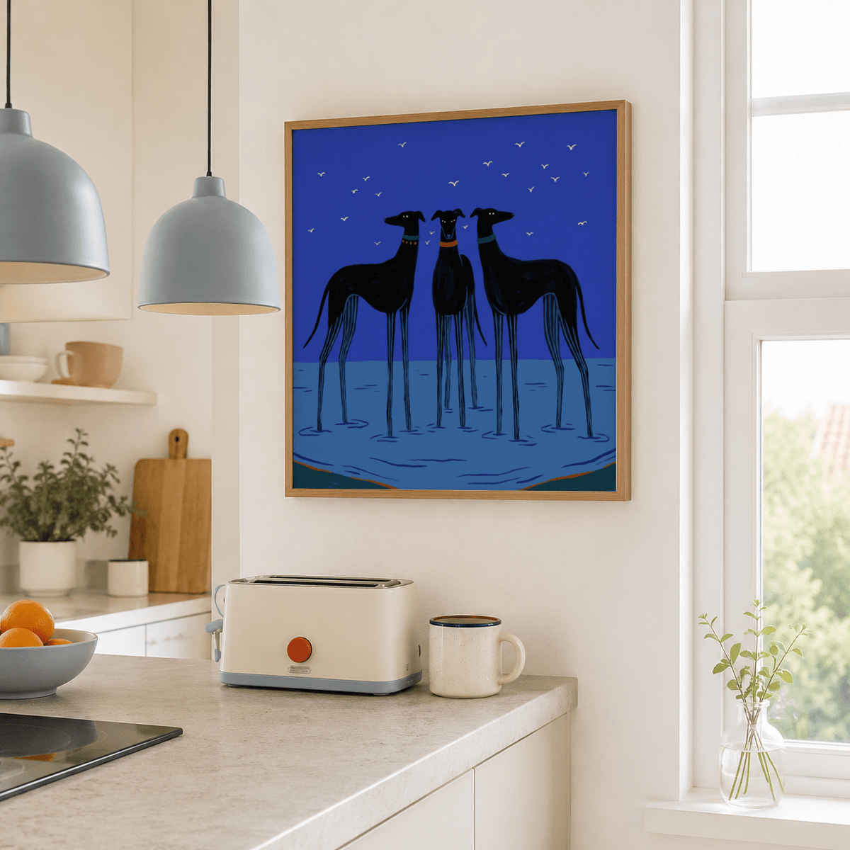 Framed poster showing trio of slim black dogs in graphic style
