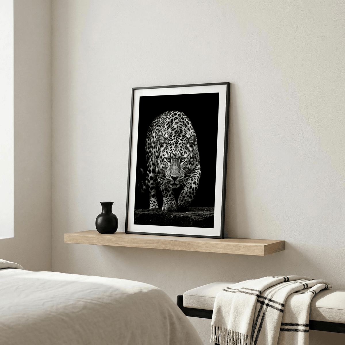 Monochrome big cat wall art with a central leopard figure and strong negative space
