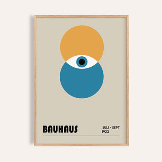 Framed Bauhaus painting with abstract eye in yellow and blue circles on beige background