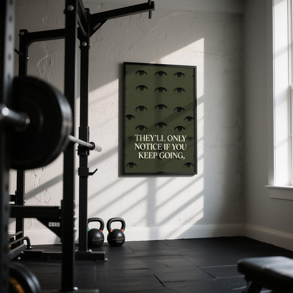 Olive-toned gym artwork featuring eyes and text, perfect for fitness room decor