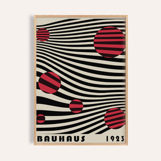 Framed close-up of Large Bauhaus Wall Art with red striped circles on black wavy lines