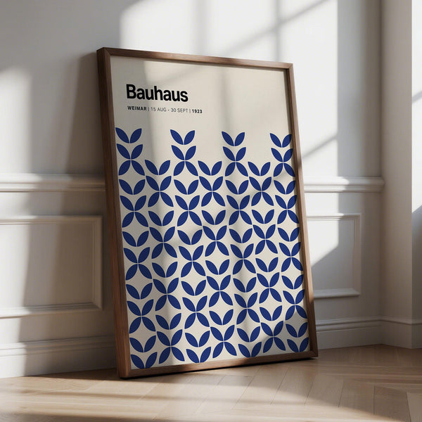 Simple wall art with blue geometric pattern on beige background in Bauhaus style.