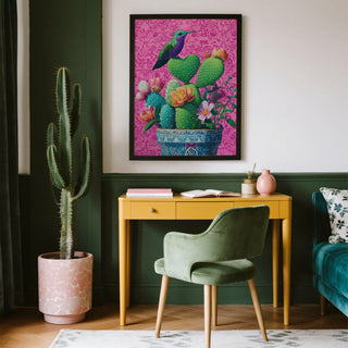 Hummingbird perched on heart shaped cactus against floral pink background