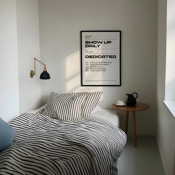 Motivational wall art featuring “Show Up Daily” and “Dedicated” in modern layout.