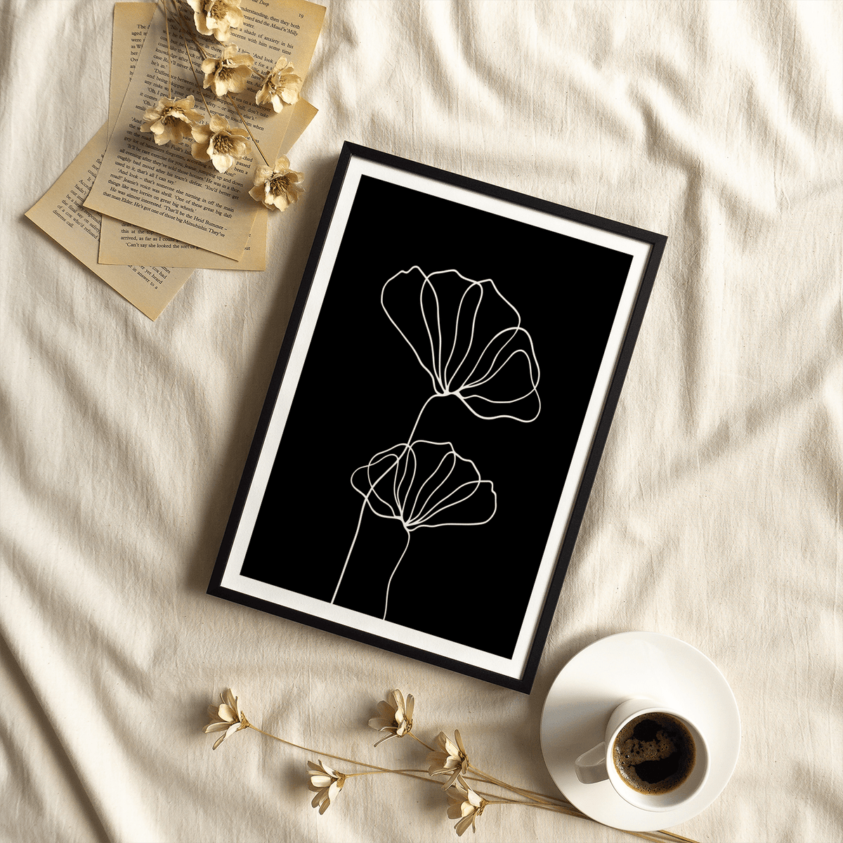 Monochrome wall art showing two outlined flowers and long stems