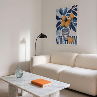 Orange blue wall art styled above dining bench with neutral tones.