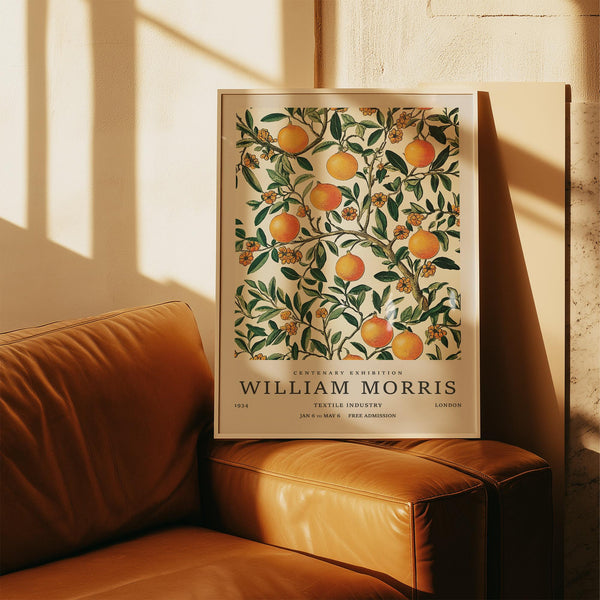 Green and orange wall art featuring ripe oranges and flowering vines.