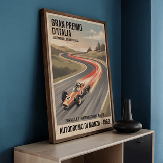 Landscape-style wall art print with winding circuit, distant hills, trees, and a single-seater race car