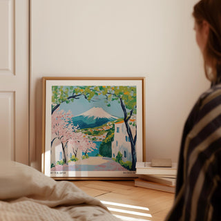 Scenic Japan Poster featuring cherry blossom-lined view of Mt. Fuji.