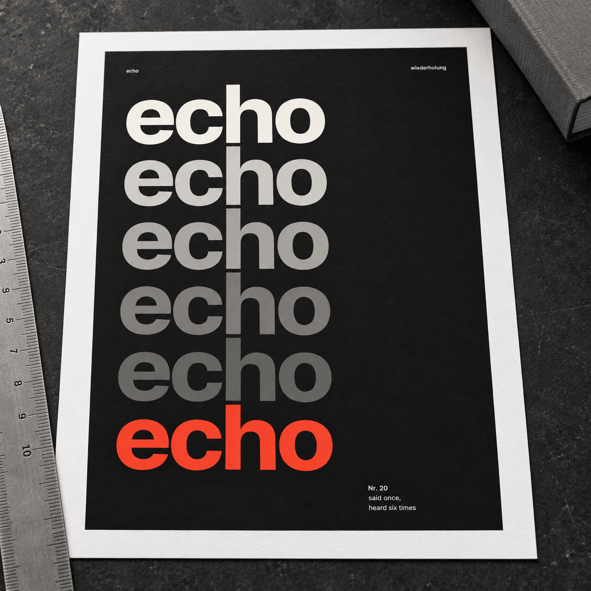 Close view of the black and cream word art print on smooth matte paper