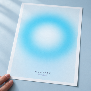 Close view of the white and aqua halo print on smooth matte paper
