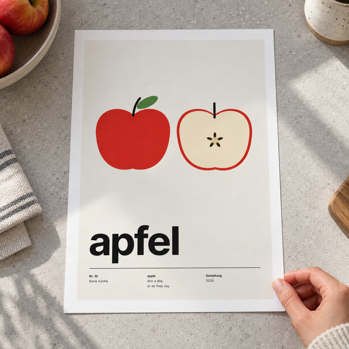 Close view of the Swiss style apple typography print on smooth matte paper