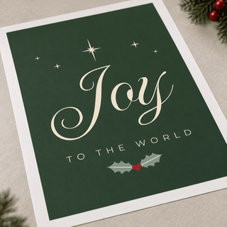 Detail of the cream Joy script, guiding star and red berry holly sprig
