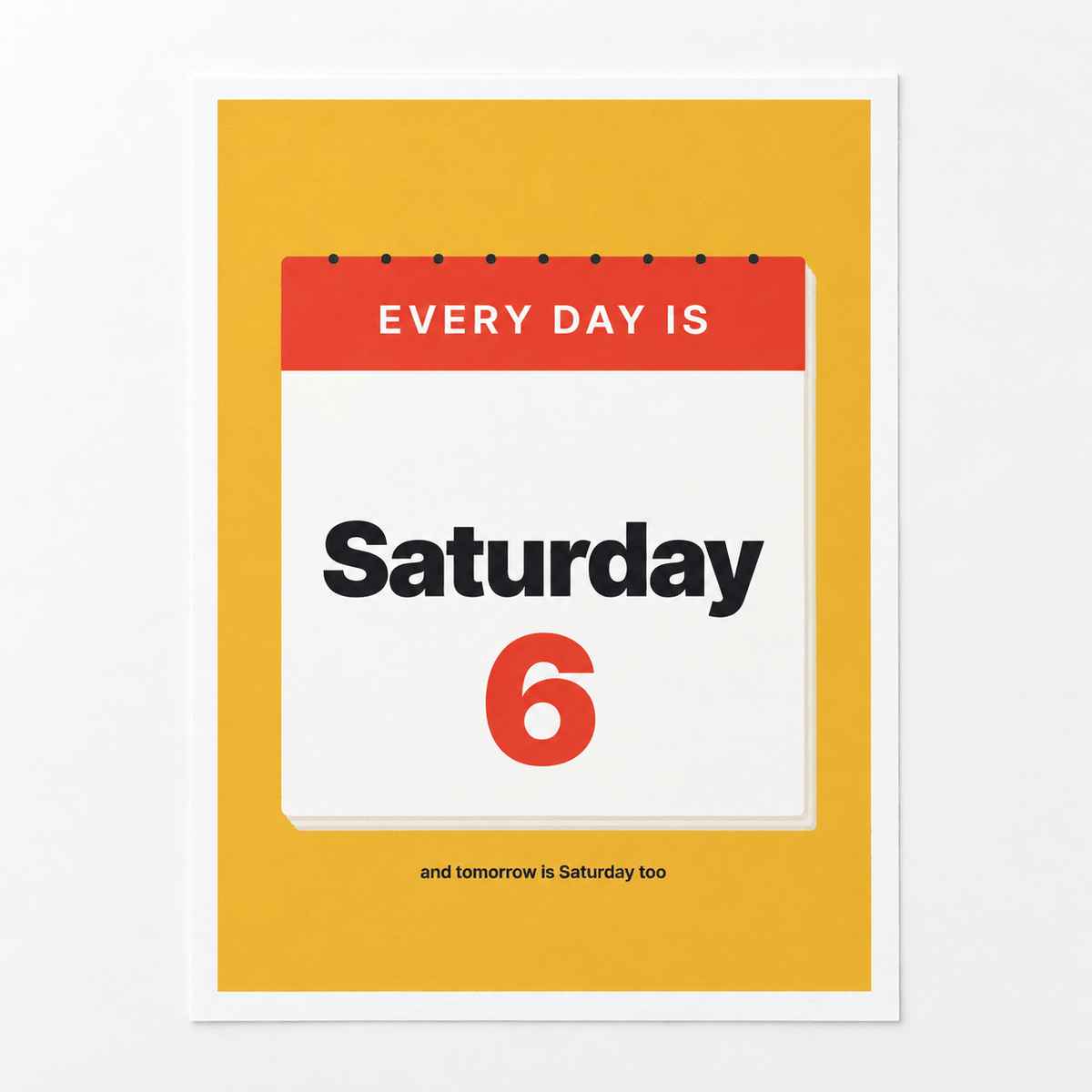 Close view of the mustard Saturday calendar print on smooth matte paper