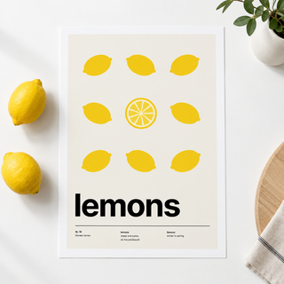 Close view of the lemons with one cut in half on smooth matte paper