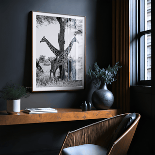 Cropped scene of giraffes standing near a tree in a savanna landscape poster