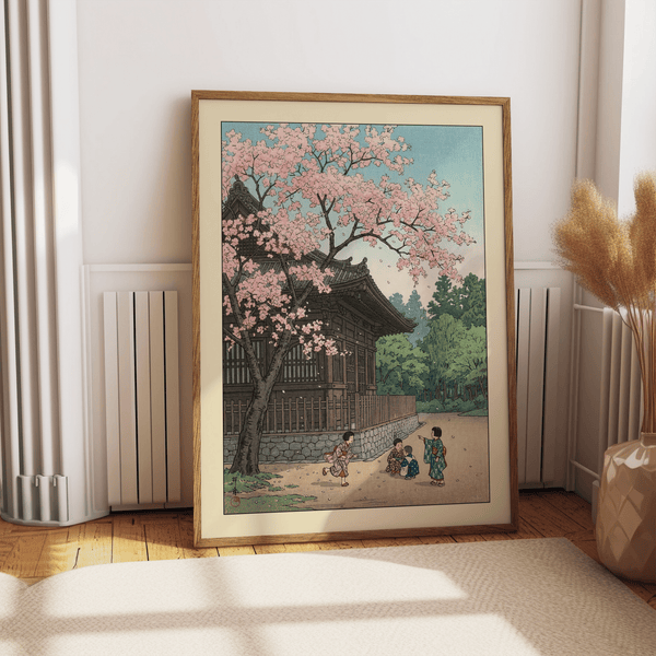 Close-up of wooden temple roof set against pink cherry blossoms