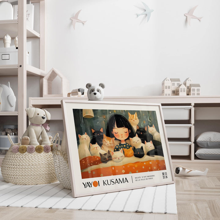 Cat art print leaning on a floor with a teddy bear head and children's room toys