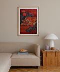 Wildlife print showing reclining tiger framed by broad lily pads and lotus flowers