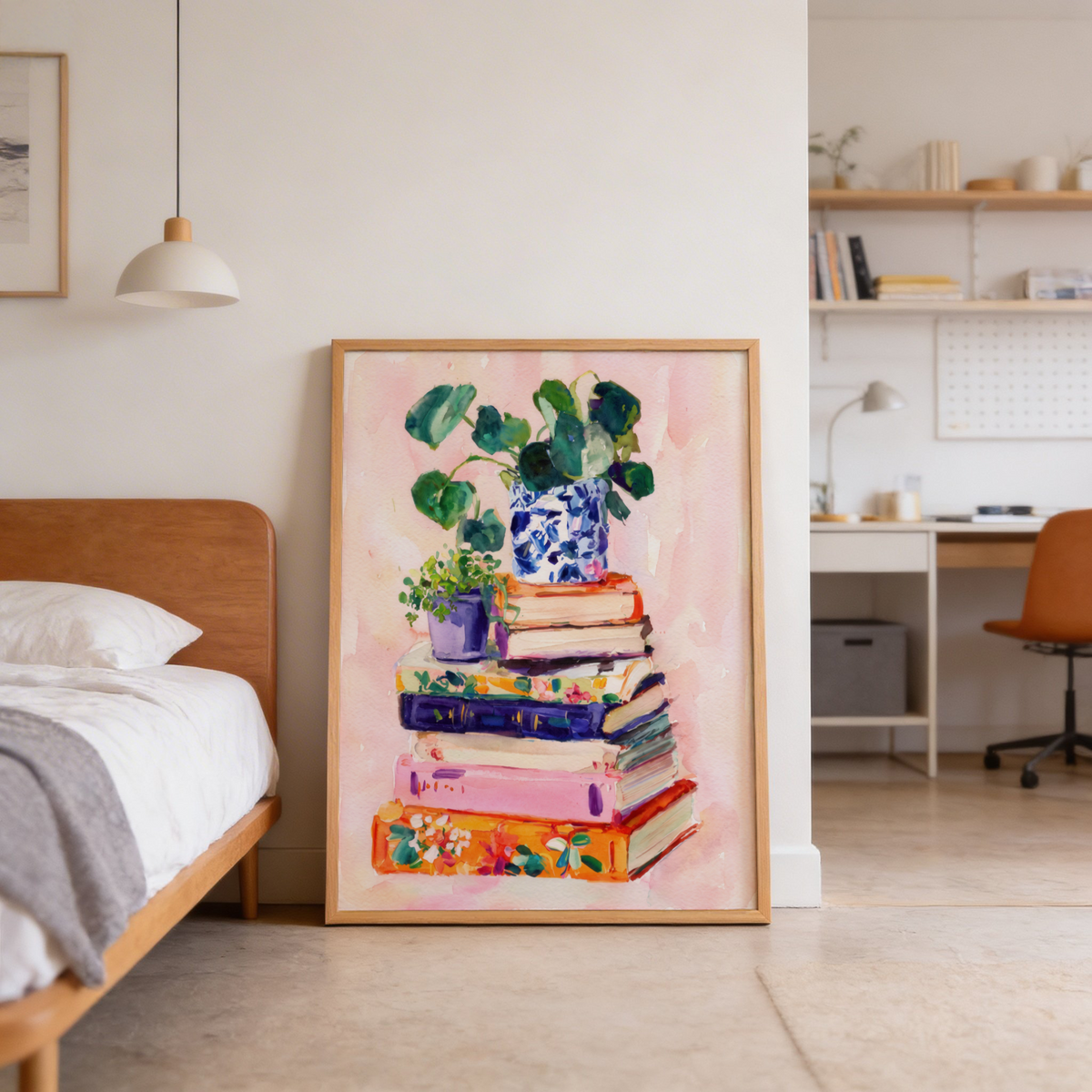 Books and Plants Art Print showing a tall stack of colorful books and leafy plants