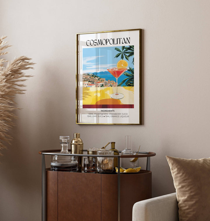 Drink Art framed print of a cosmopolitan cocktail glass and lemon slice above a drinks trolley