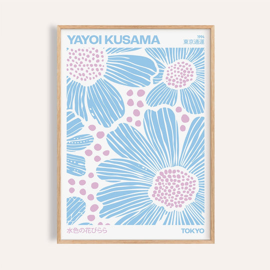 Light blue wall art featuring floral abstract design