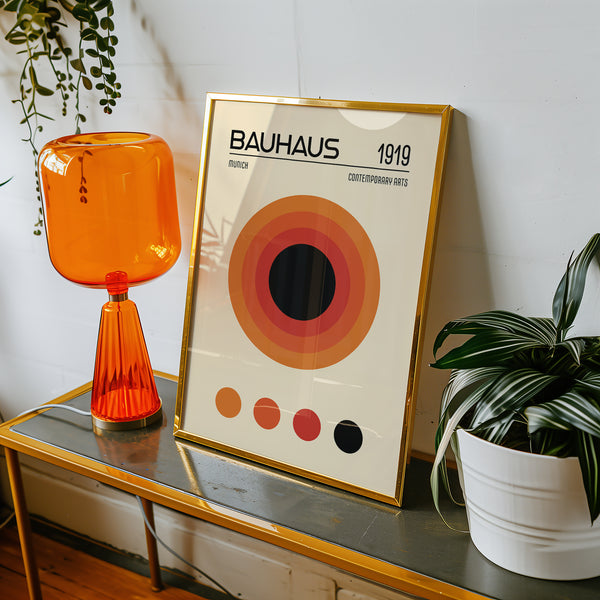 Retro-inspired orange Bauhaus poster with bold circular design

