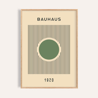 Framed Bauhaus poster with green circle and black lines on cream background