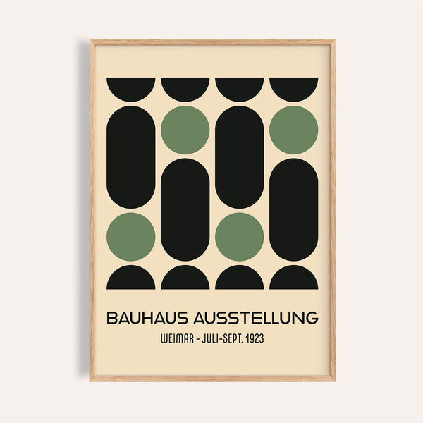Green and black wall art for office with geometric shapes