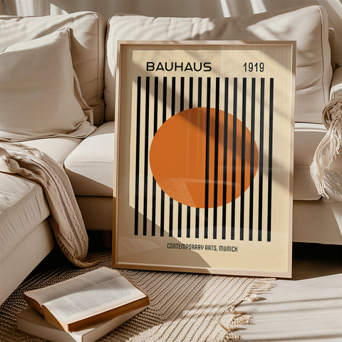 Minimalist Bauhaus wall art with bold orange circle and black lines
