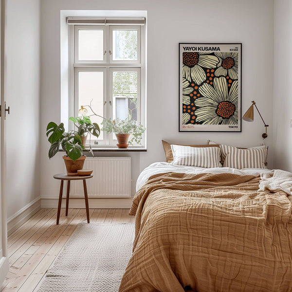 Bold black and orange modern floral art print for contemporary bedrooms