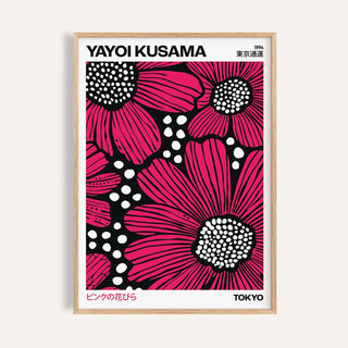 Pink posters with bold floral designs in black and white contrast