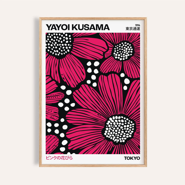 Pink posters with bold floral designs in black and white contrast