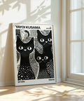 Yayoi Kusama-inspired black and white cats poster with polka dots