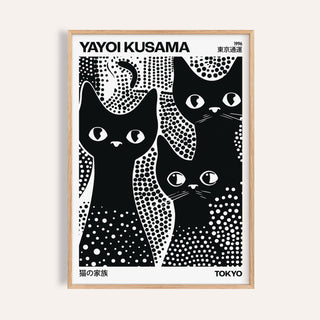 Framed close-up of Black Cats Poster showing three black cats with white spots in minimalist style