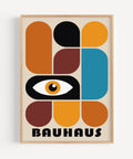 Abstract Bauhaus wall art with eye motif in deep brown, orange, teal, and black