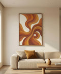 Modern living room with a beige sofa, abstract wall art, and wooden coffee table.
