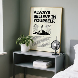 Bedside table art showing a gold framed poster with a positive quote.