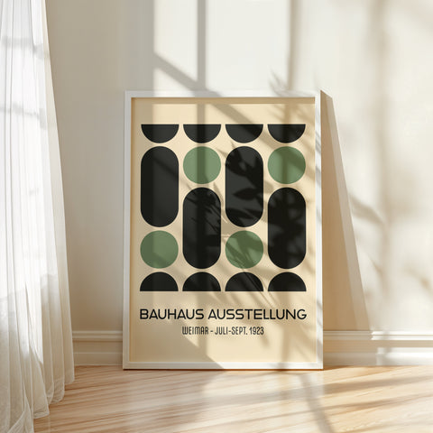 Closeup of green and black Bauhaus poster