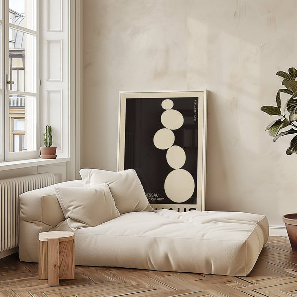 Balancing stones wall art in black and cream tones