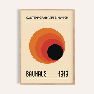 Framed Prints Bauhaus with concentric circles in orange and black on cream background