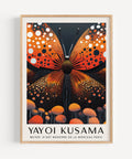 Yayoi Kusama-inspired butterfly wall art with bold orange and black design.
