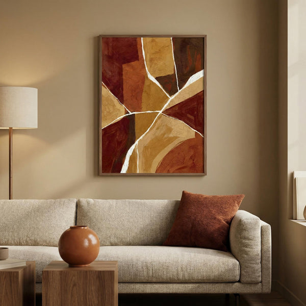 Living room with a beige sofa, abstract painting, and decorative items.
