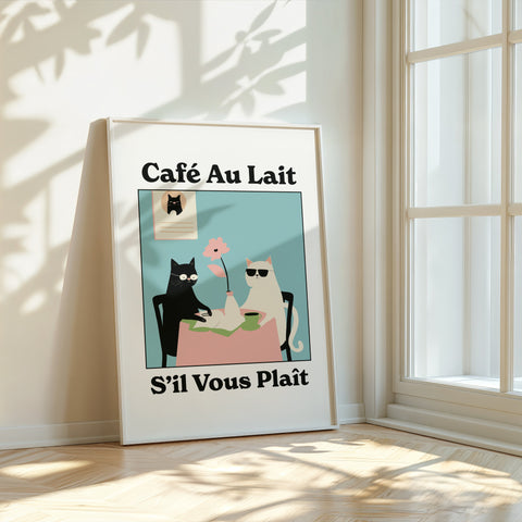 Quirky wall art featuring pink and blue cats at a French café