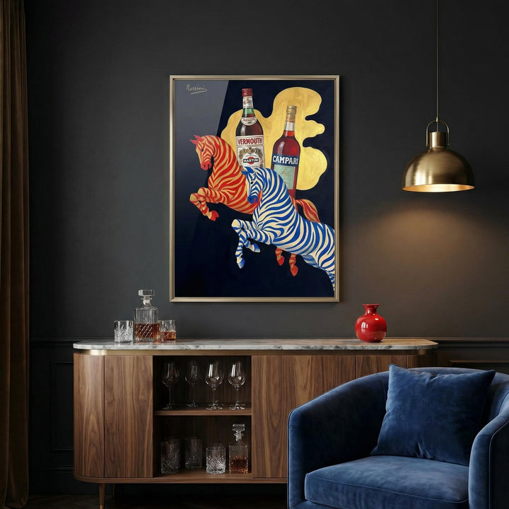 Vintage Beverage Art print with red and blue striped horses against a gold splash in a dark room above a cabinet