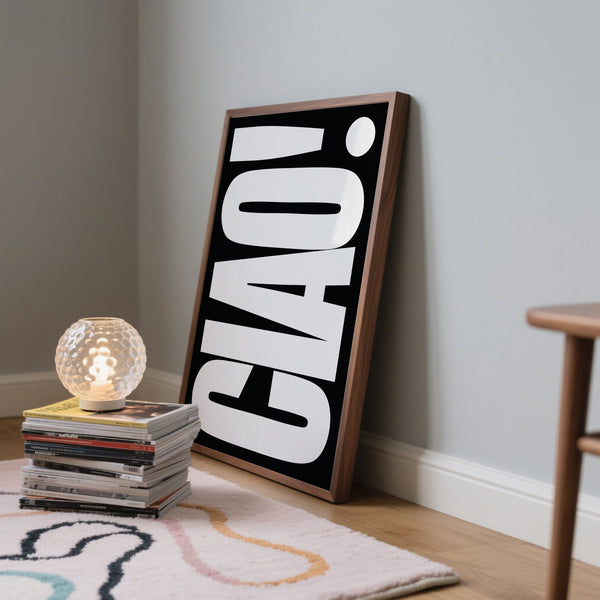 Poster of Ciao! leaning against a wall framed in walnut