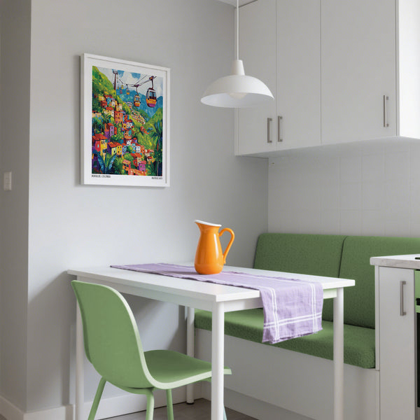 Small dining area with a white table, green chairs, and a colorful Colombia wall art above table.