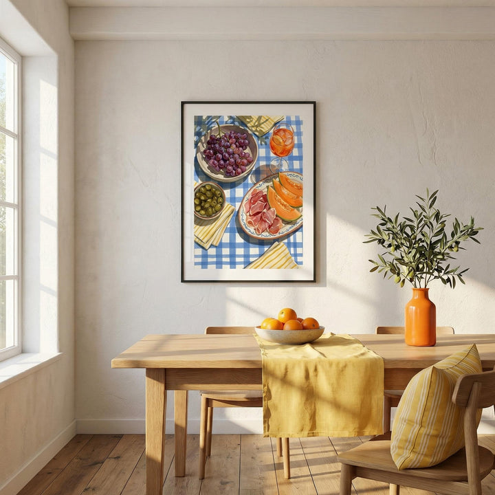 Picnic Decor wall art of grapes olives and melon slices above a dining table with a bowl of tangerines