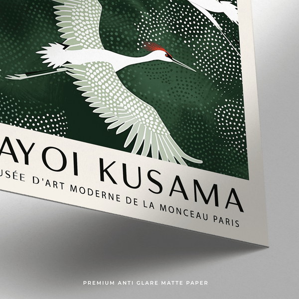 Japandi Wall Art of Cranes flying in white with green background.