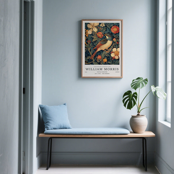 Vintage bird prints showing a detailed bird amid cream blossoms and leafy vines.